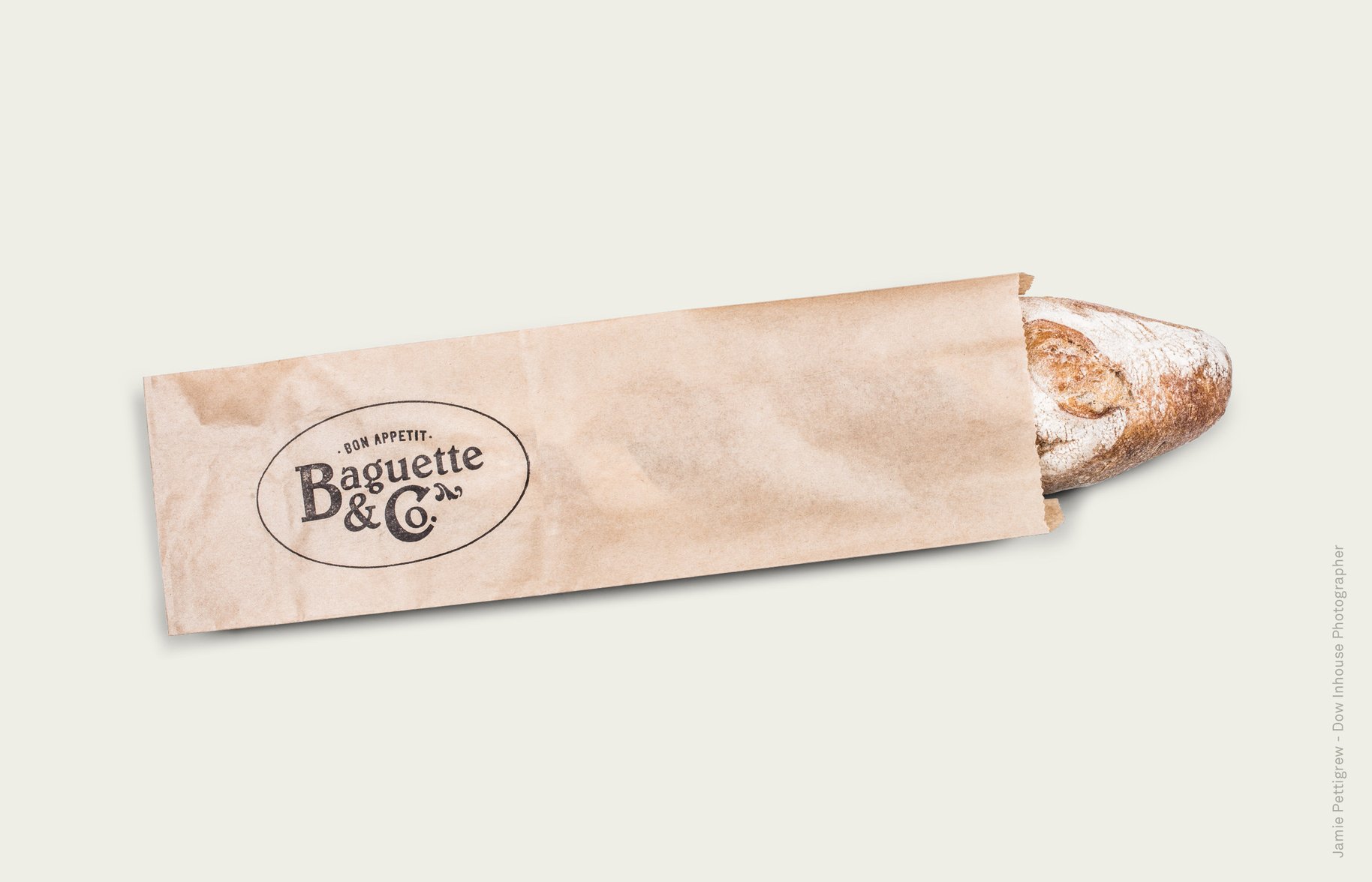 Baguette & Co logo on paper baguette bag